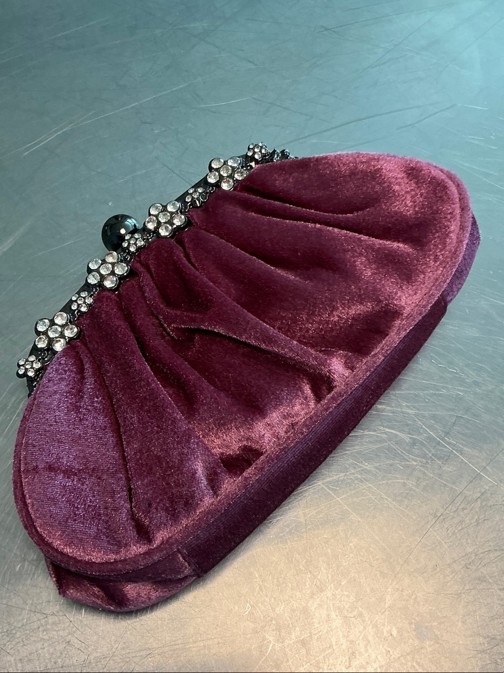 Cargo crossbody evening bag. Quality rhinestone trim on gunmetal frame.